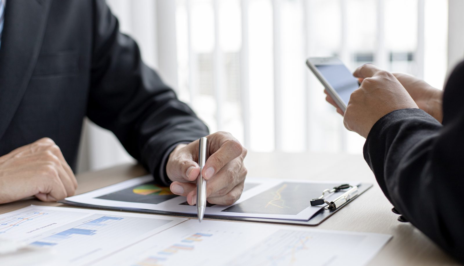 Advocates reviewing documents with a client
